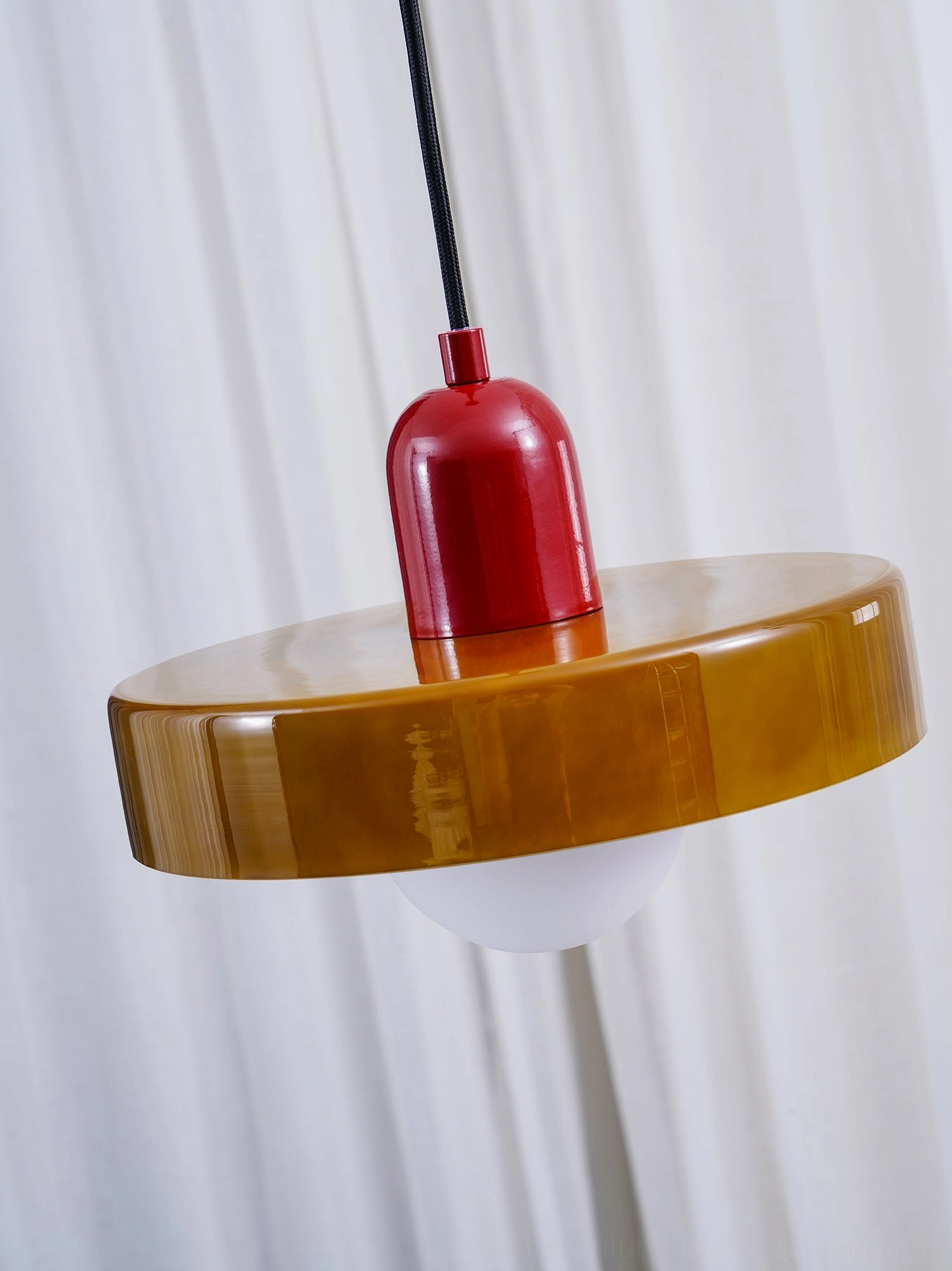 Disc Orb Pendant Light close-up of geometric design and light diffusion