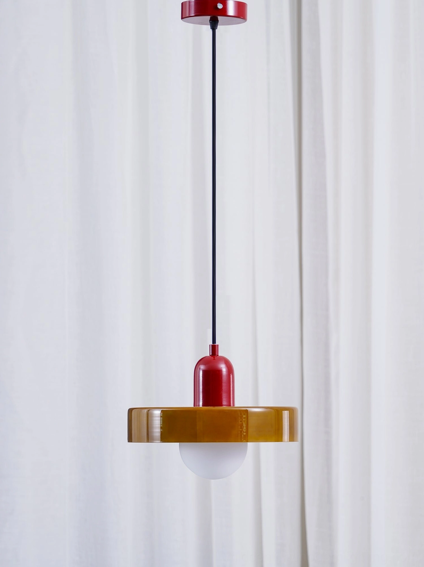 Disc Orb Pendant Light showcasing two-tone metal frame and frosted orb diffuser