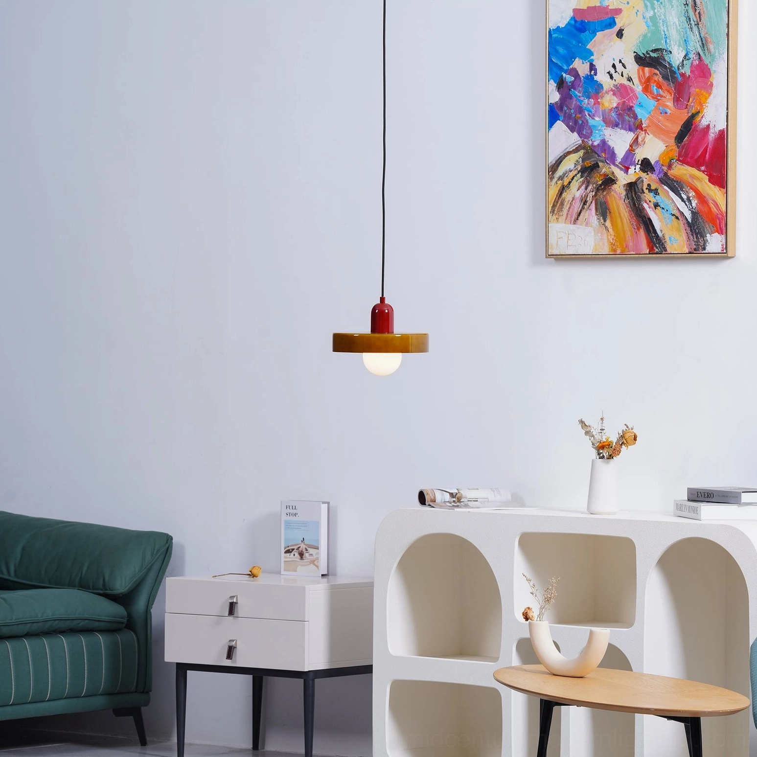 Disc Orb Pendant Light red variant above table setting