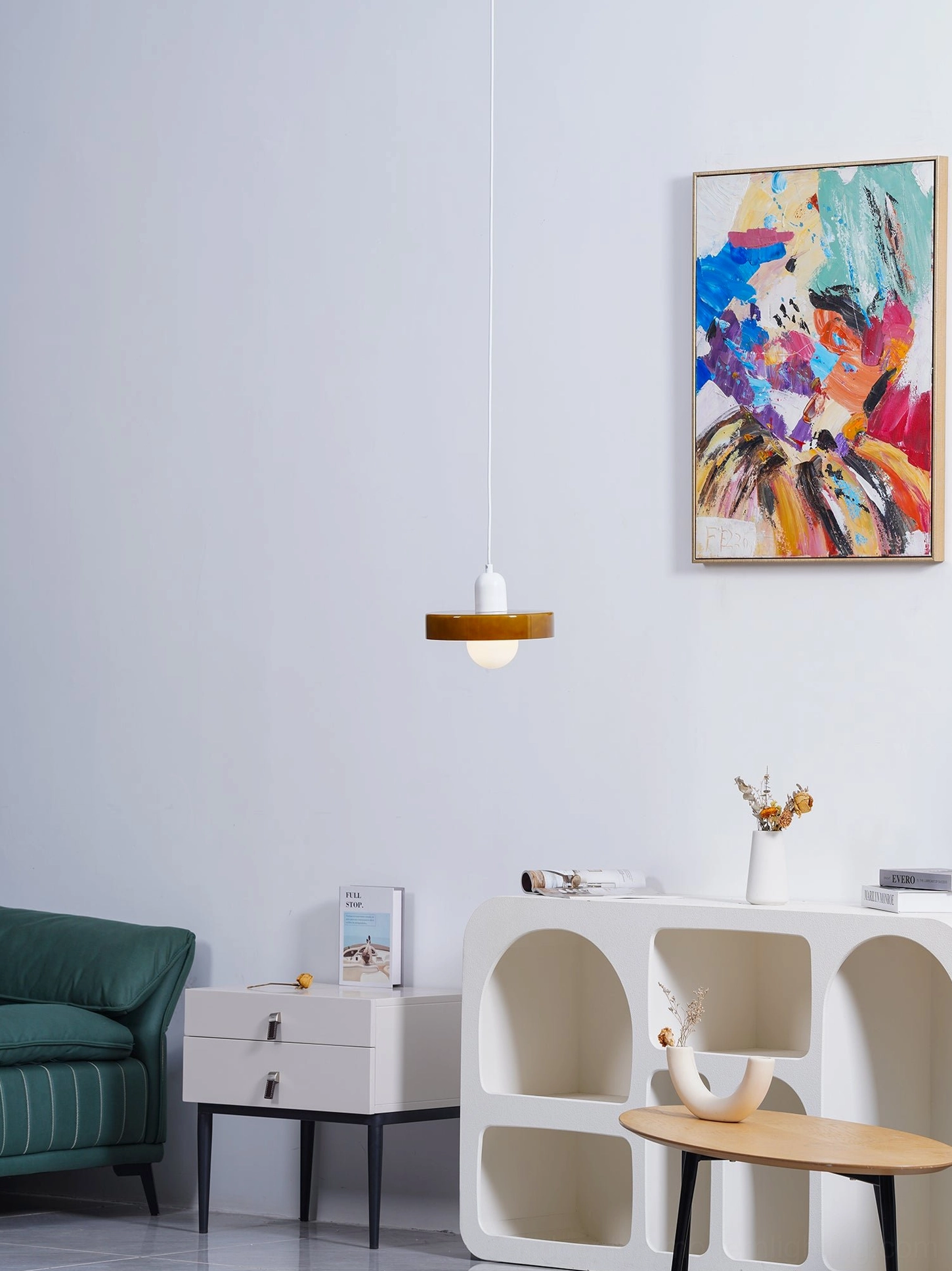 Disc Orb Pendant Light white finish hanging in contemporary interior