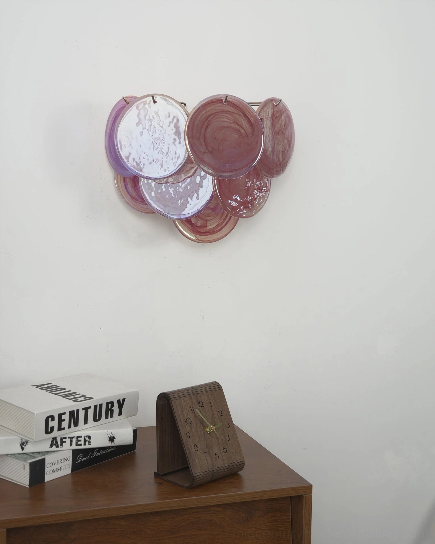 Disc wall lamp in bohemian home decor setting, artisanal glass lighting feature