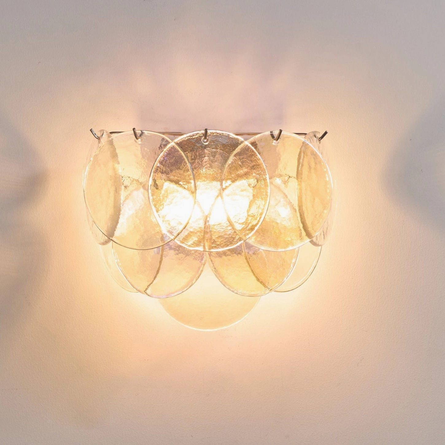 Mid-century modern disc wall lamp with artisanal glass, contemporary interior design showcase