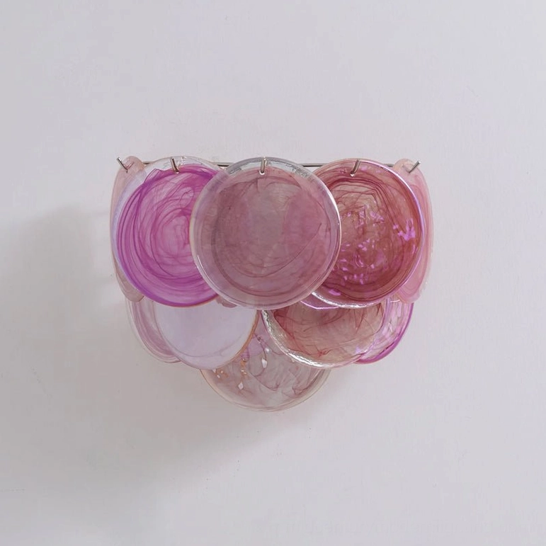Purple-pink tinted cluster disc wall lamp, handcrafted glass studio view