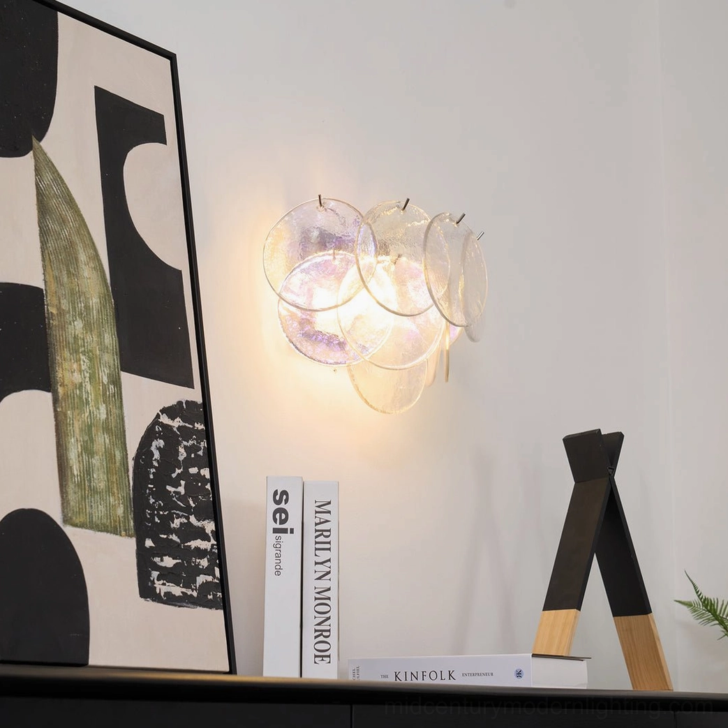 Disc wall lamp showing translucent glass pattern detail, light refraction through handcrafted discs