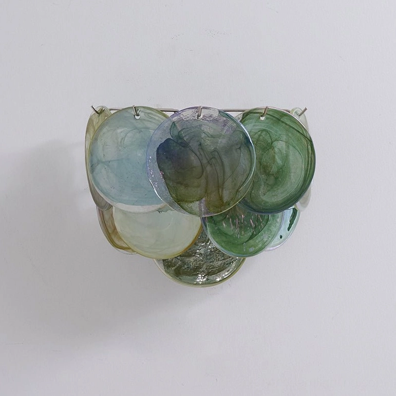 Yellow clouds disc wall lamp, warm tone glass finish in studio background