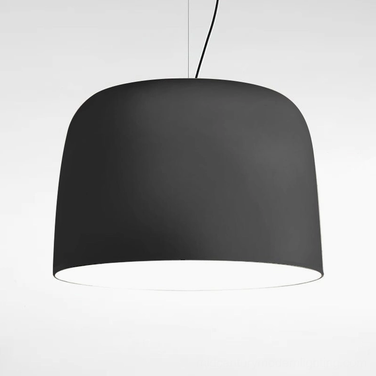 Large Djembe pendant lamp creating focal point in contemporary dining or living area