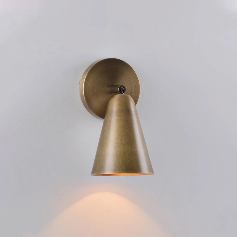 Donna antique brass swivel sconce model showing vintage-inspired patina finish