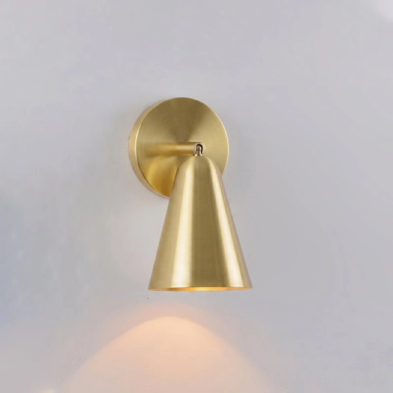 Donna polished brass sconce variant showing reflective metallic surface quality