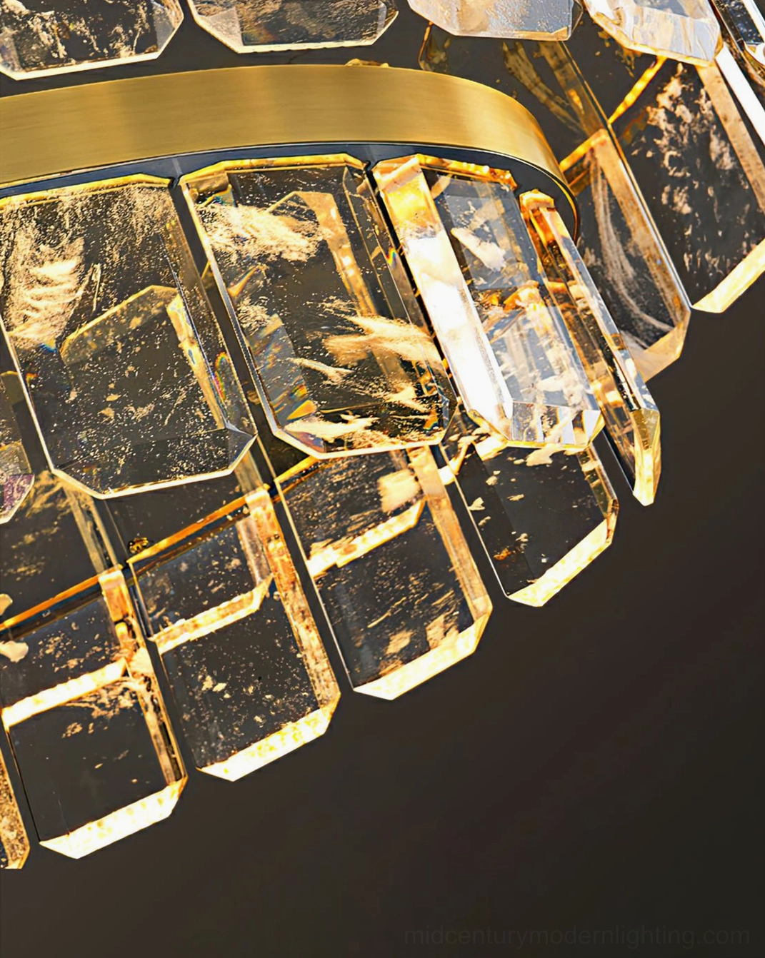 Doria chandelier crystal detail macro photography showing precision-cut faceted crystals and brass metal frame