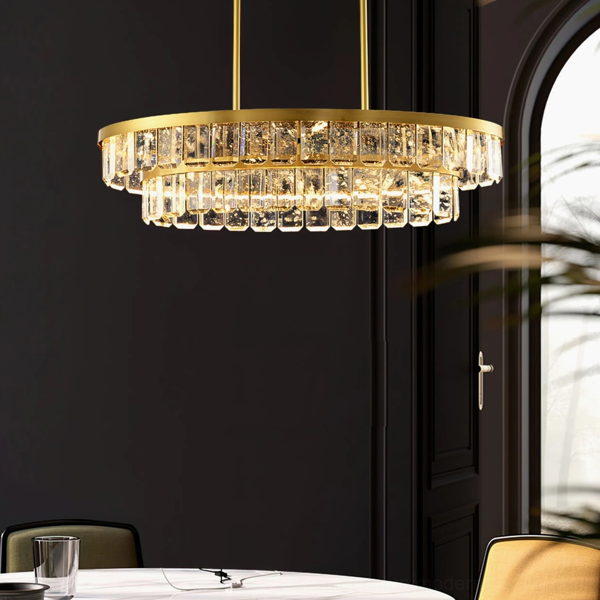 Modern crystal chandelier Doria low-angle close-up view showing detailed faceted crystal pendants in elegant dining space