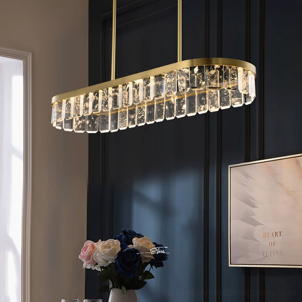 Contemporary linear crystal chandelier Doria in minimalist dining space with dark blue walls and modern design