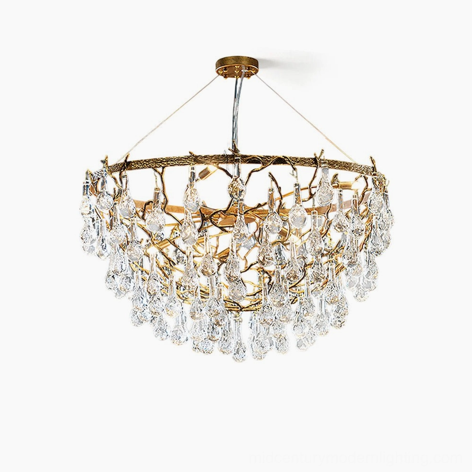 Doris antique brass crystal chandelier with cascading glass drops, front view against white backdrop showing organic twig frame and ten G9 sockets