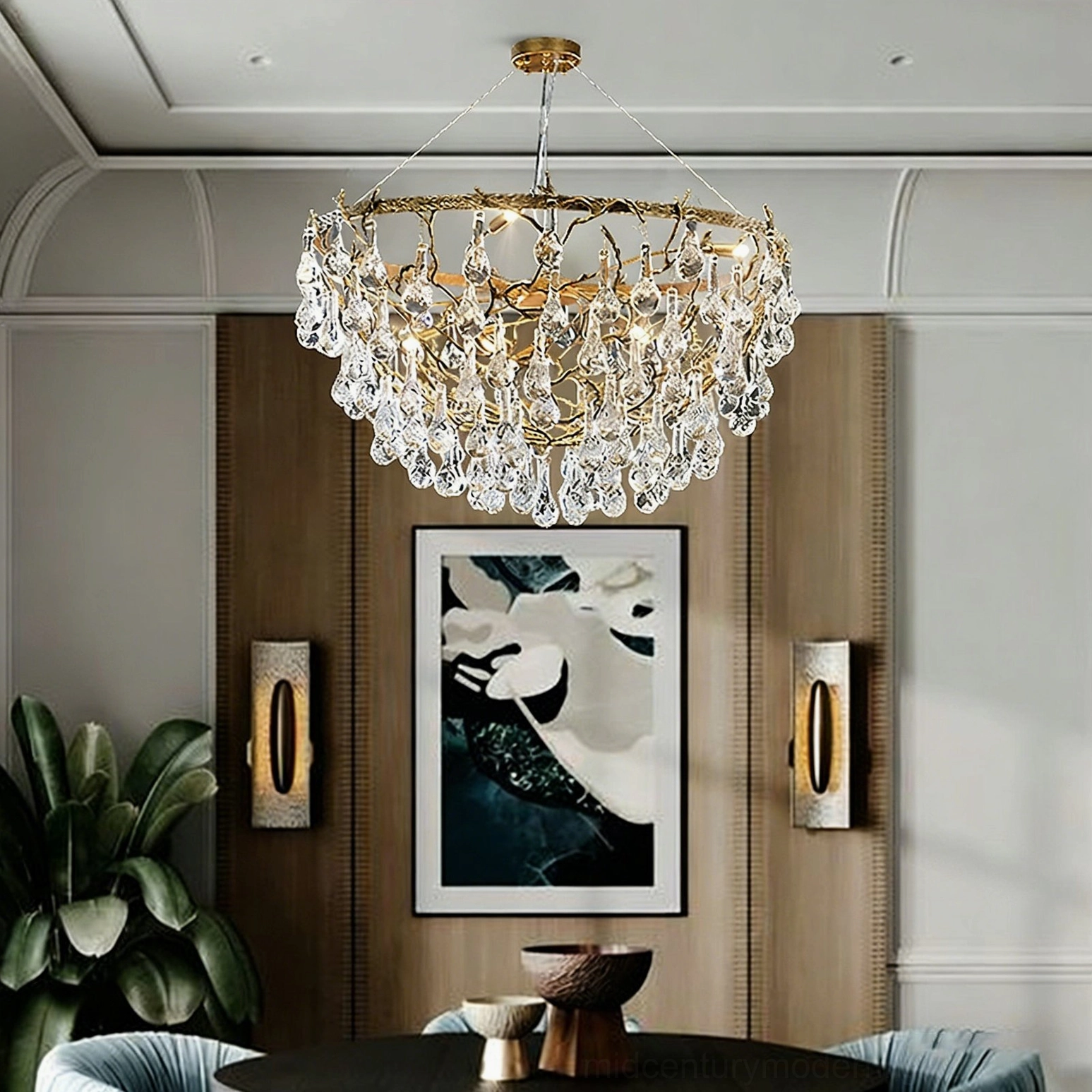 Doris mid-century modern antique brass crystal chandelier hanging in dining room with artwork wall and elegant home decor styling