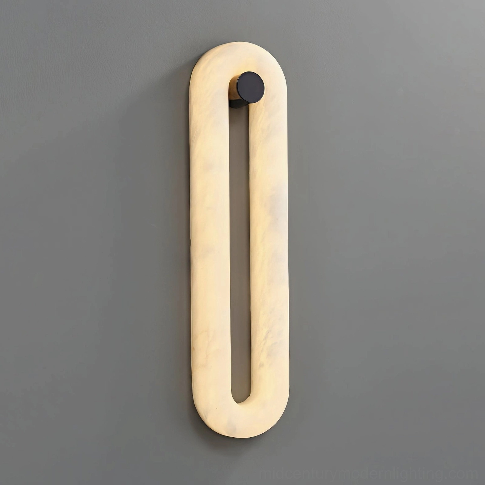 Dromo alabaster wall sconce showing integrated LED illumination and modern black metal mounting