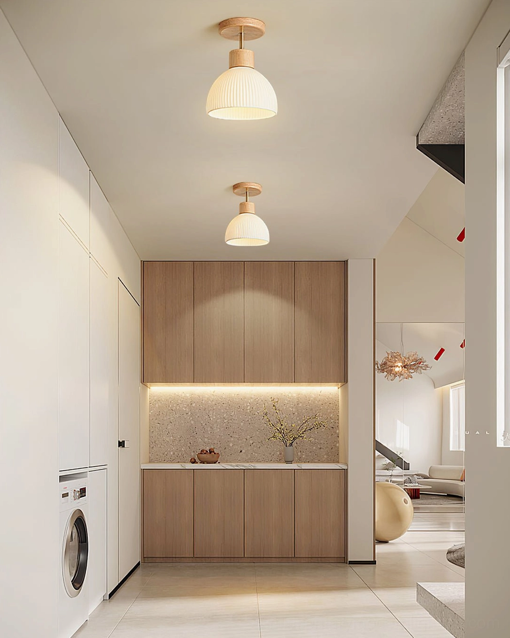 Two ribbed ceiling fixtures illuminating kitchen and laundry nook, warm wood tone