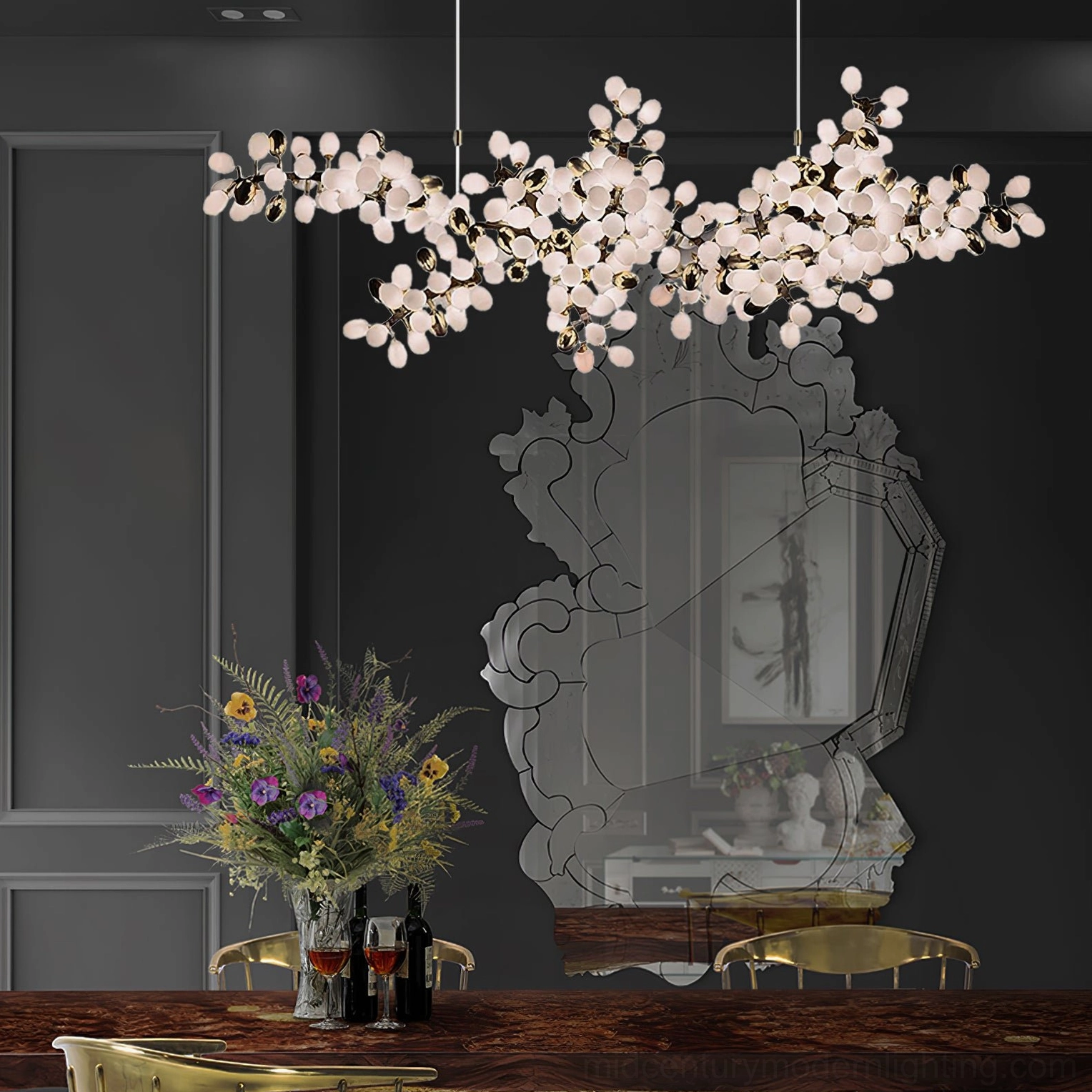 Dual cluster grape chandelier mounted above formal dining table with elegant wall art background