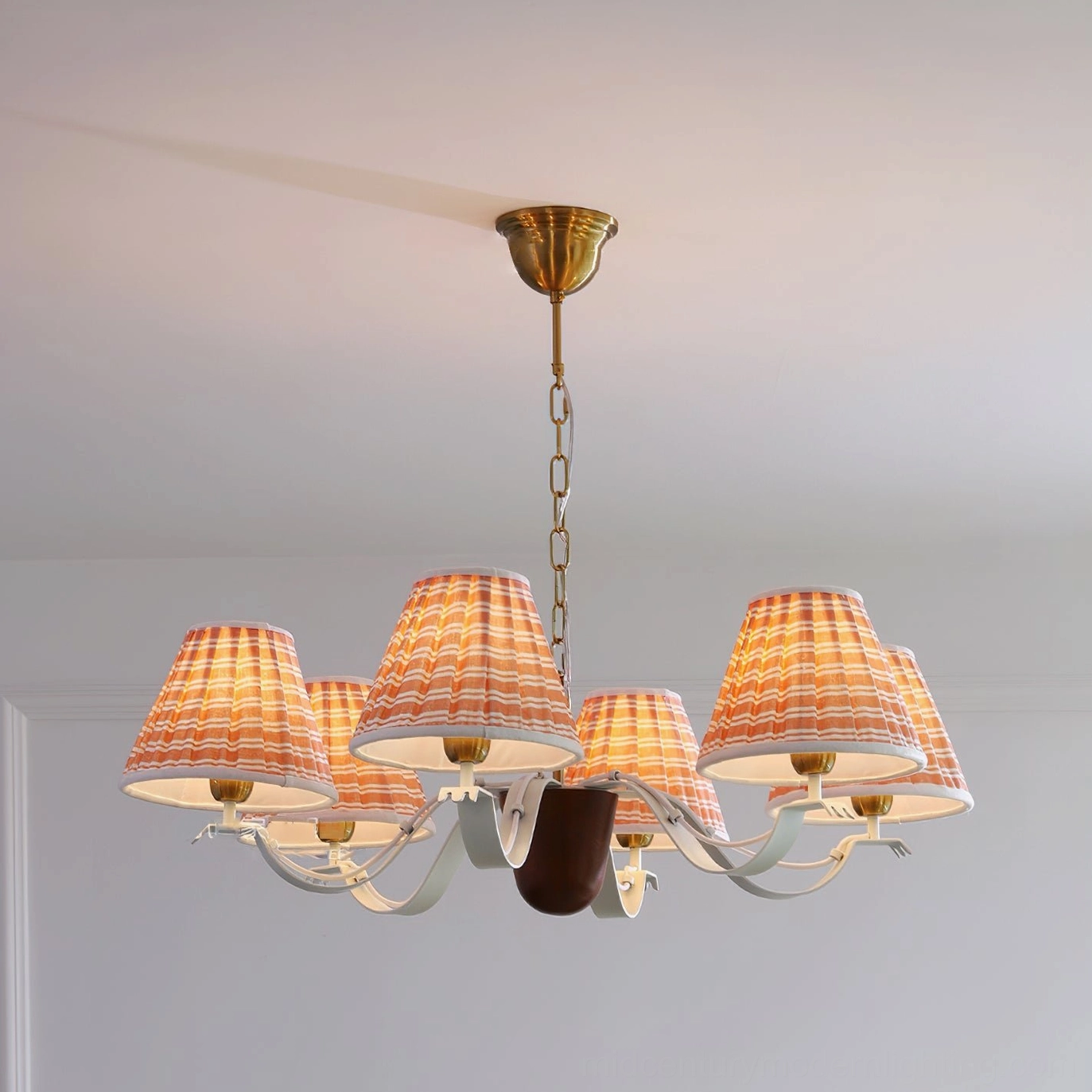 6-light fabric chandelier with orange striped ruffled shades and vintage brass hardware, front overhead perspective