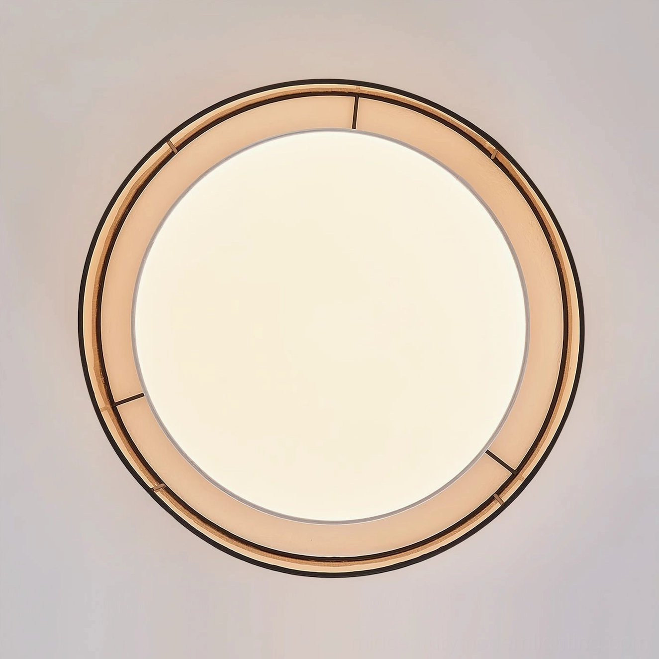 Bottom-up close-up view of Duolla ceiling light showing frosted acrylic diffuser panel and black metal frame