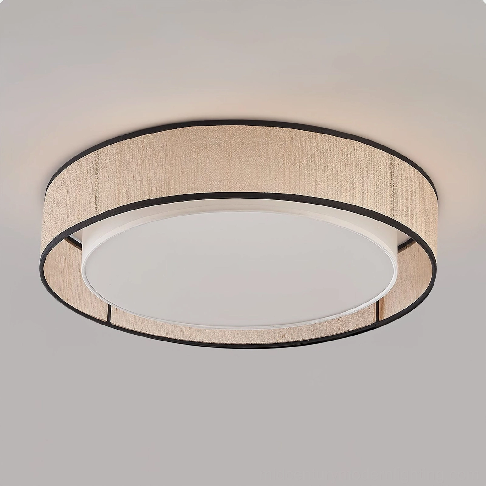 Side angle close-up of Duolla ceiling light showing layered circular fabric structure and black metal trim detail