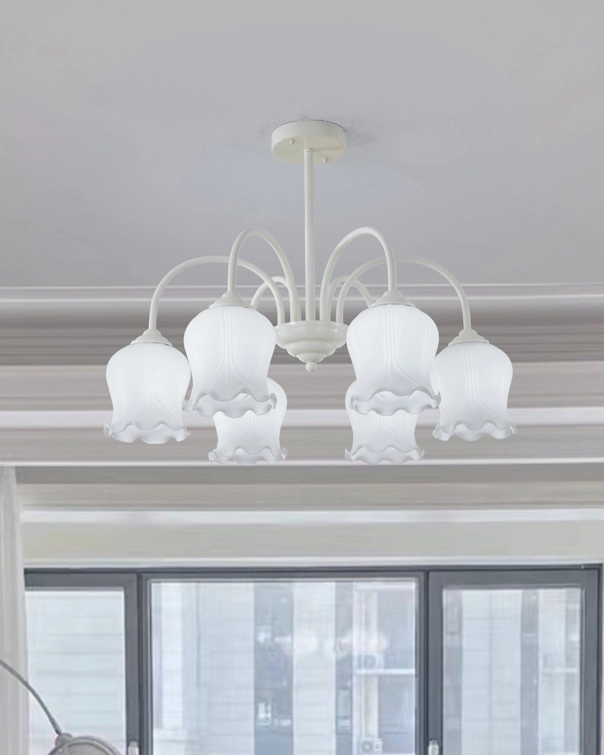 Eight-head frosted glass lily of the valley chandelier front overhead view with white metal frame and indoor window backdrop