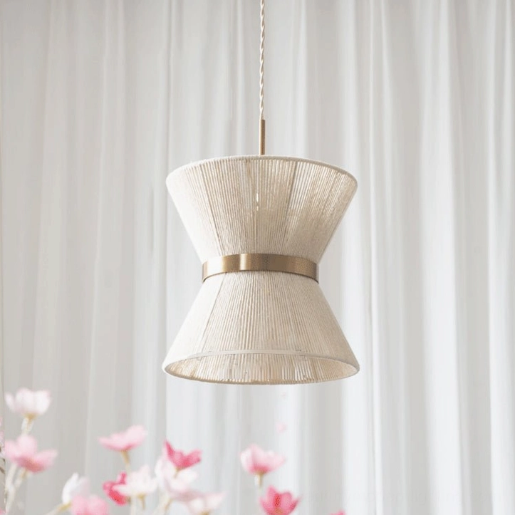 Elara Model A hourglass woven pendant light showcasing sculptural curved form with beige woven shade and polished gold metal band