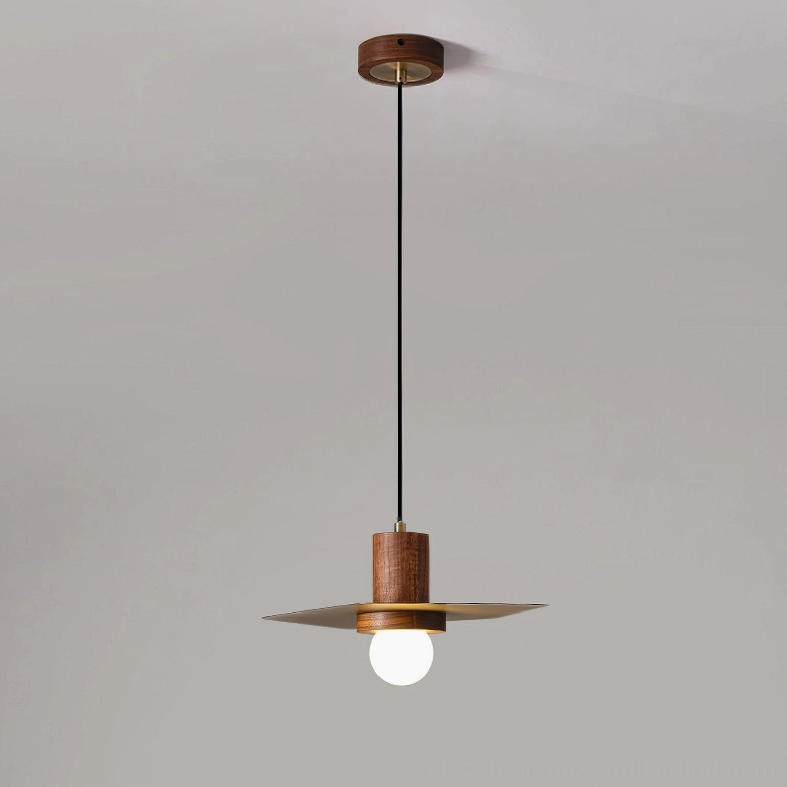 Elara pendant lamp installed in minimalist living room with Scandinavian modern furnishings