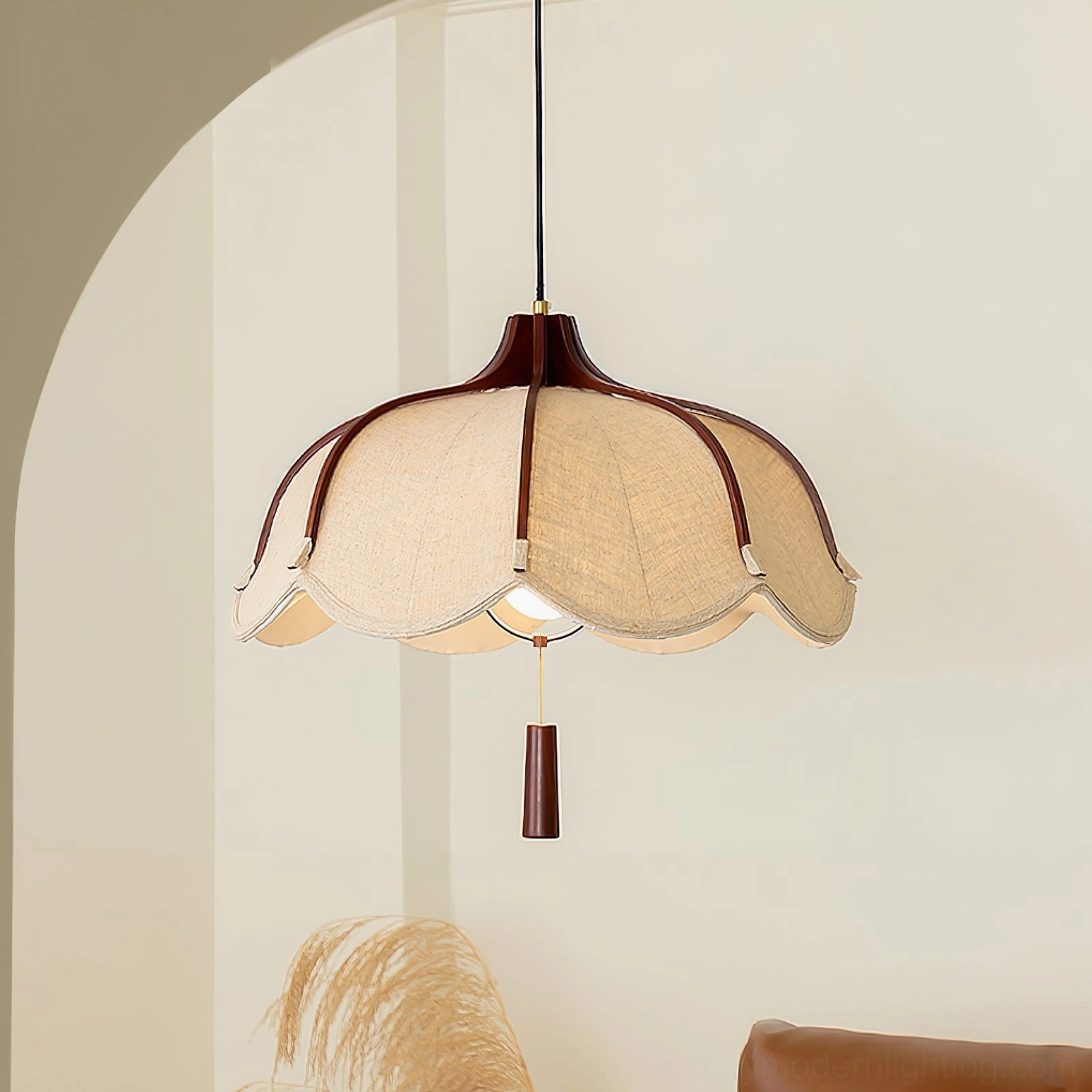 Evelyn pendant lamp installed in archway with walnut frame and beige fabric, three-quarter view showing warm vintage aesthetic