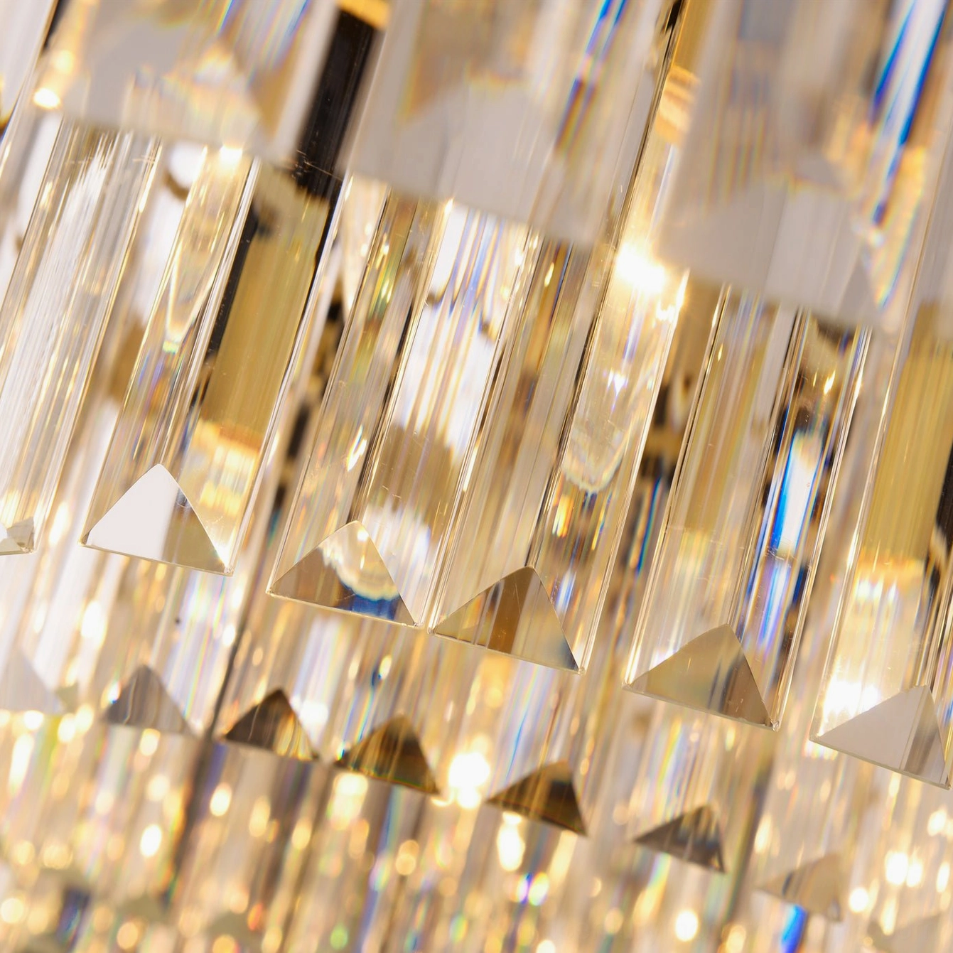 Evina crystal ceiling light macro photography showing sparkling faceted crystal with brass accents
