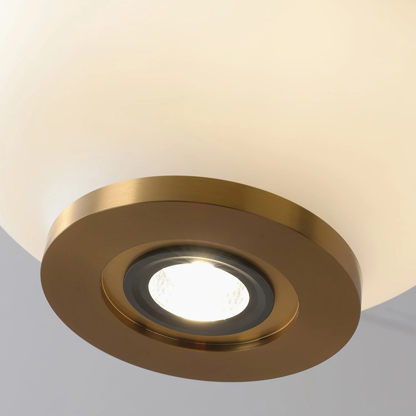 Ezio Pendant Lamp ceiling mount detail showing integrated LED and brass base