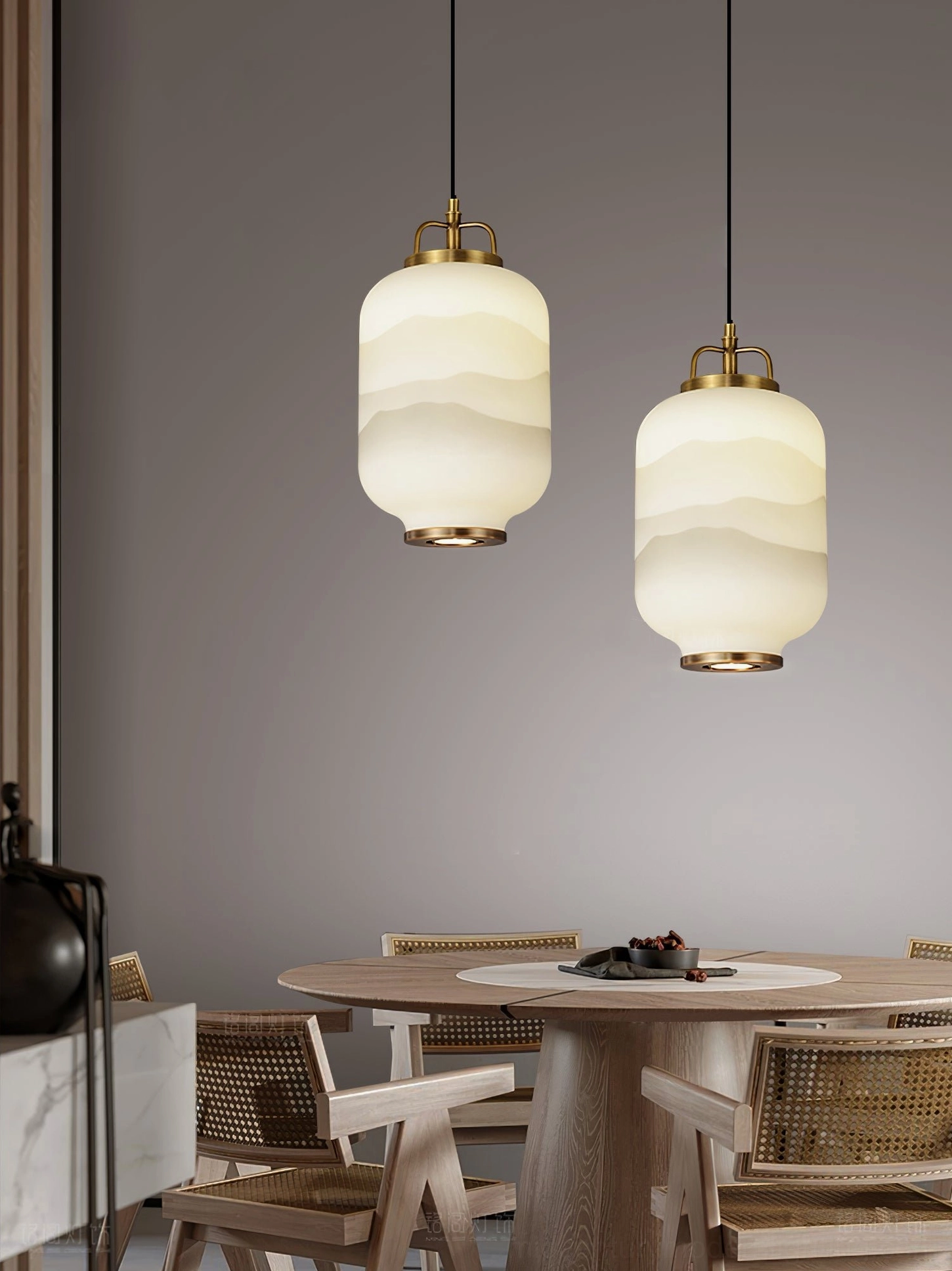 Dual Ezio Tall Mini Pendant Lamps over dining table in residential space
