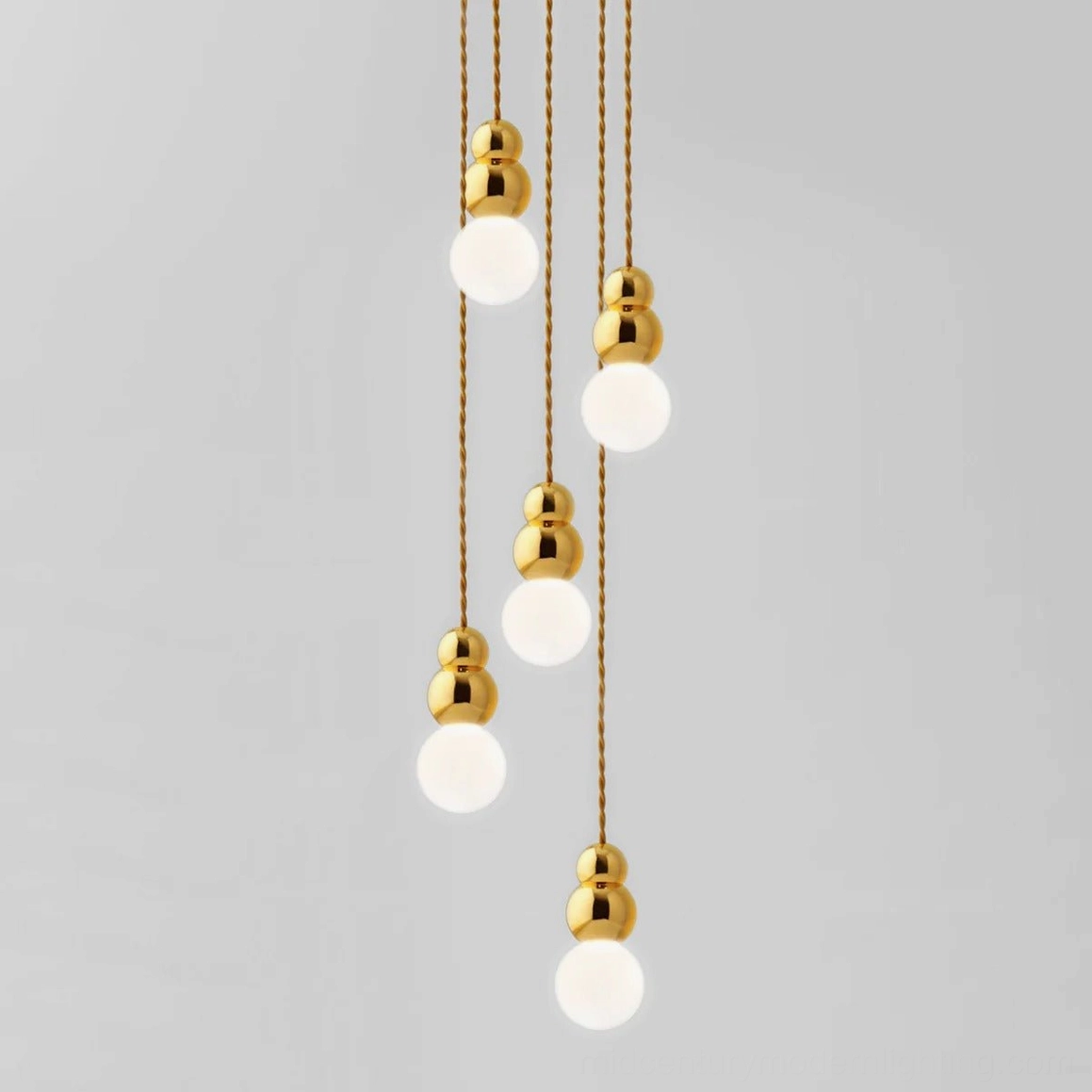 Five-head ball pendant light gold finish, polished spheres contemporary architectural lighting design