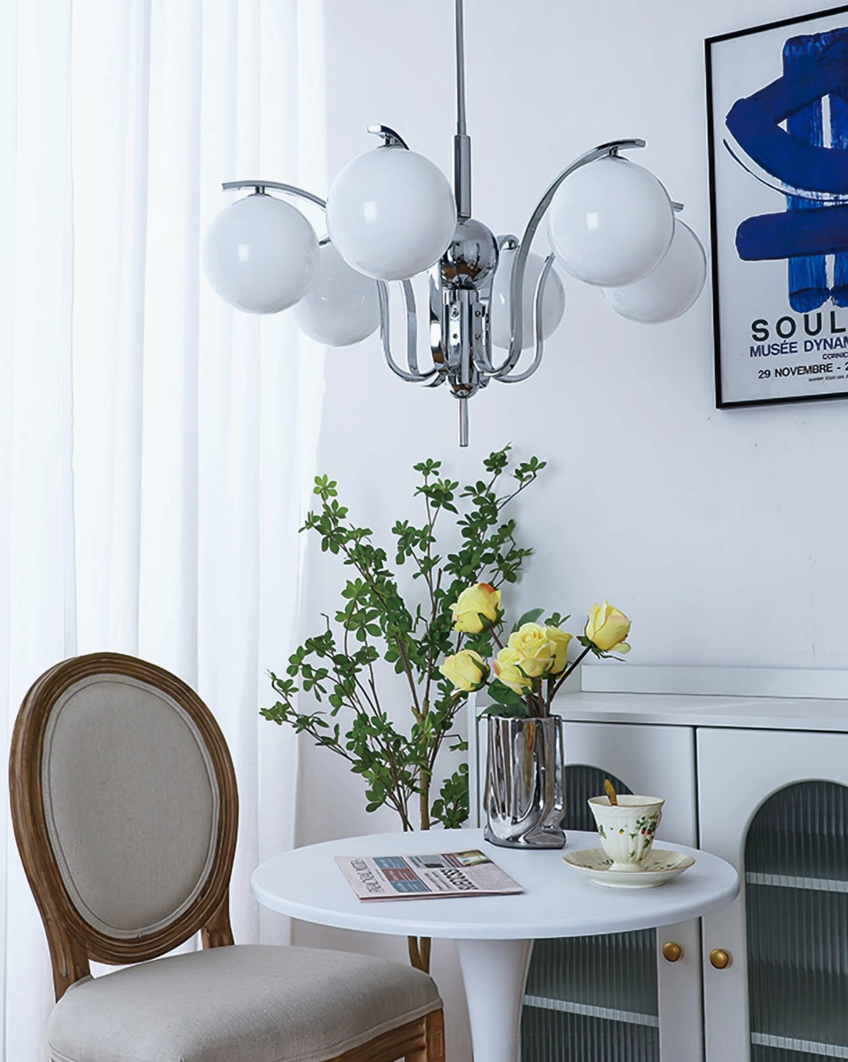 5-head glass globe chandelier mid-size configuration with chrome frame and neutral lighting