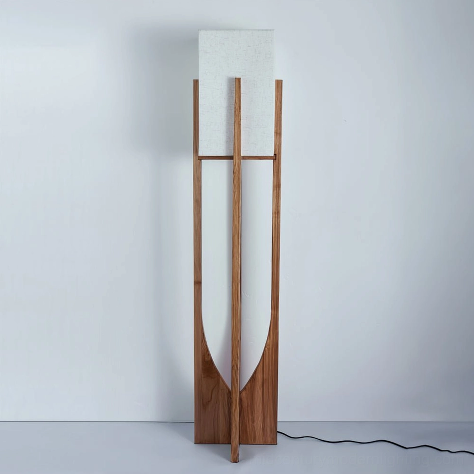 Fairbanks mid-century modern floor lamp showing exposed cord and hollow wood structure on grey background