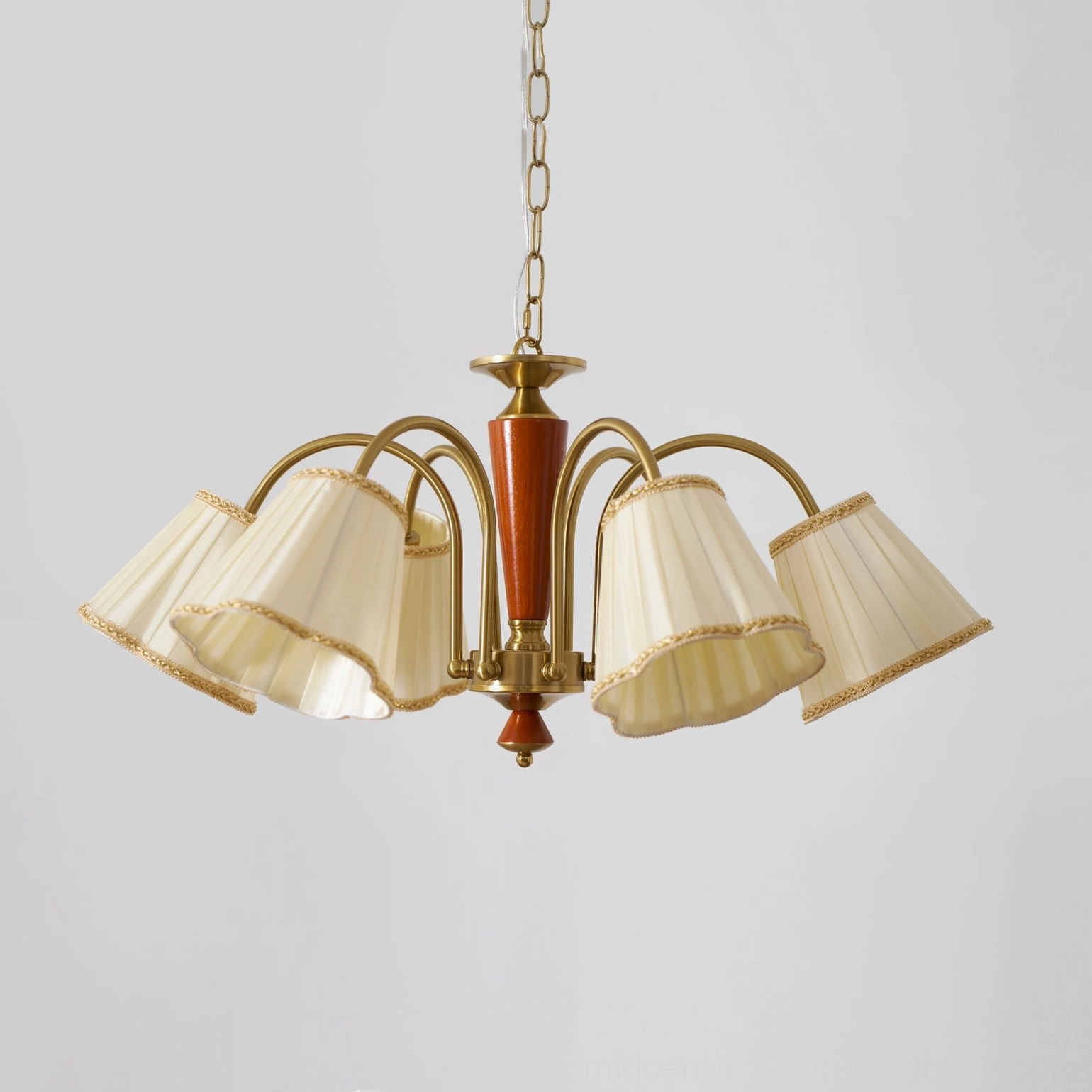 Florentine fabric chandelier close-up of pleated fabric shade texture and brass metalwork detail