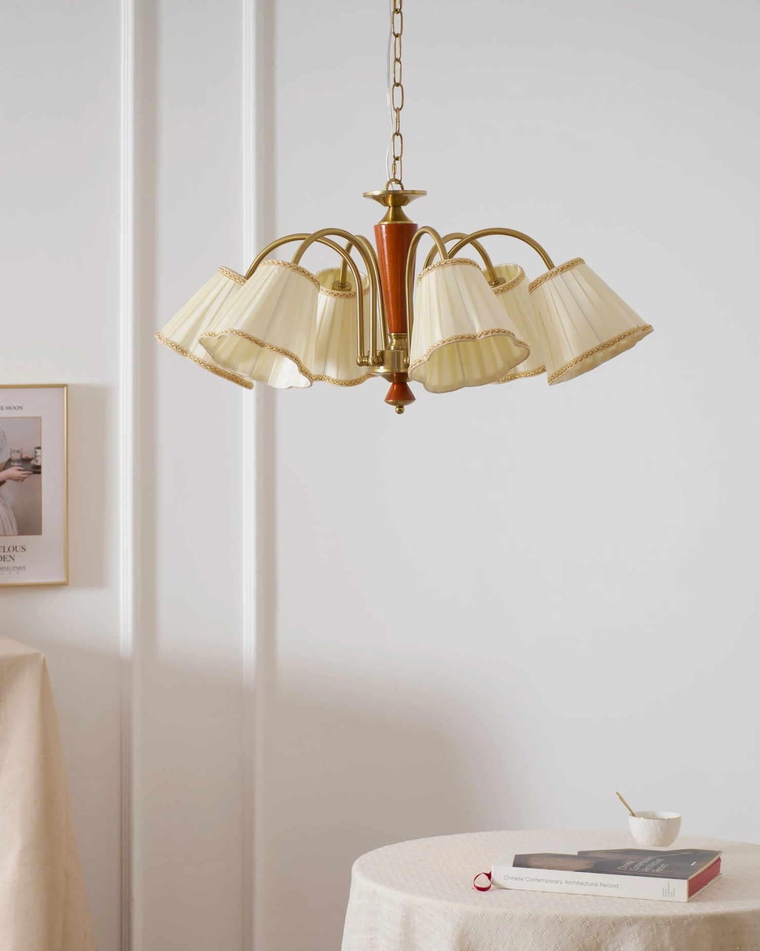 Florentine fabric chandelier side angle view with unlit pleated shades in modern wall panel interior