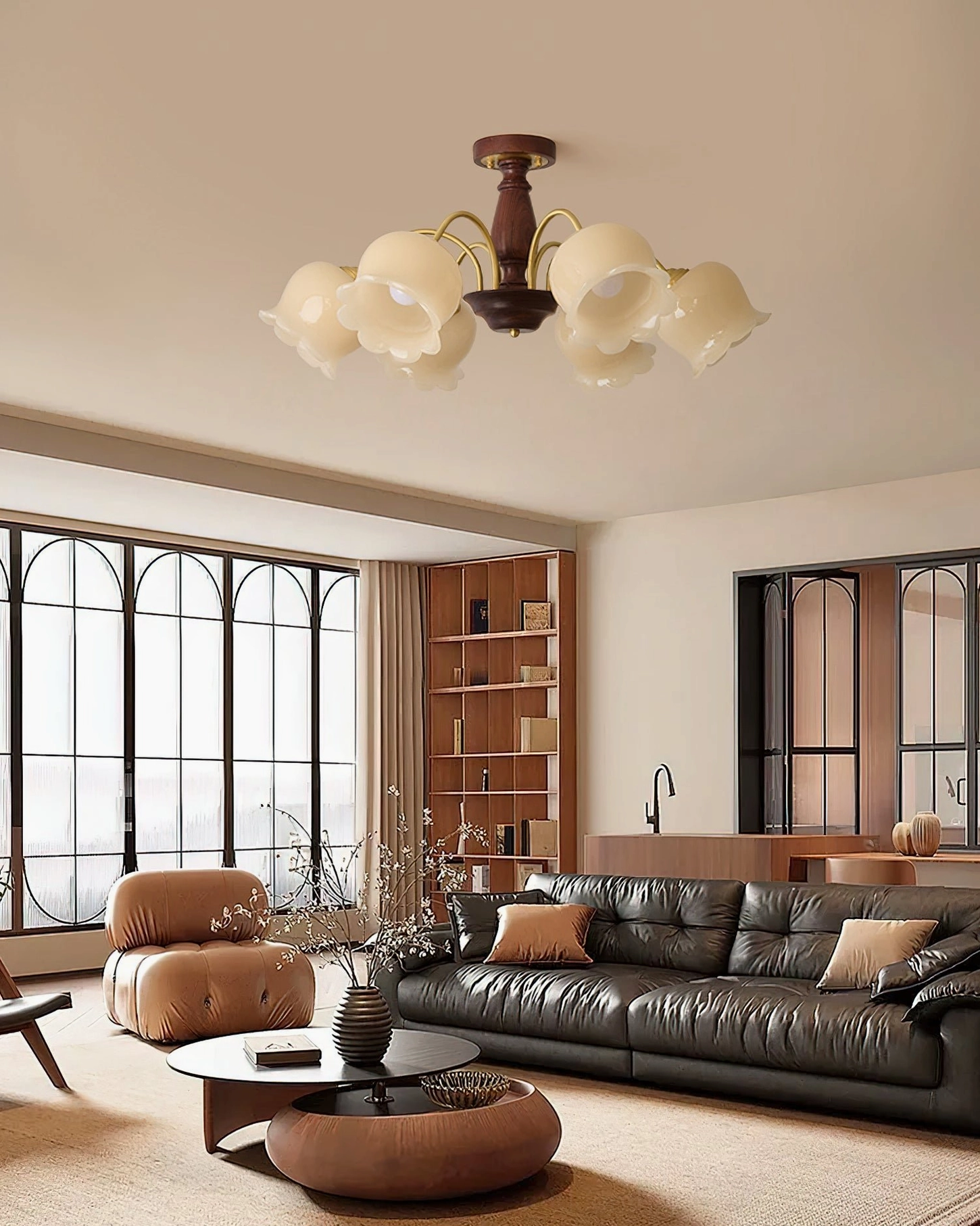 6-head flower chandelier installed in retro modern living room with black leather sofa, vintage interior design setting