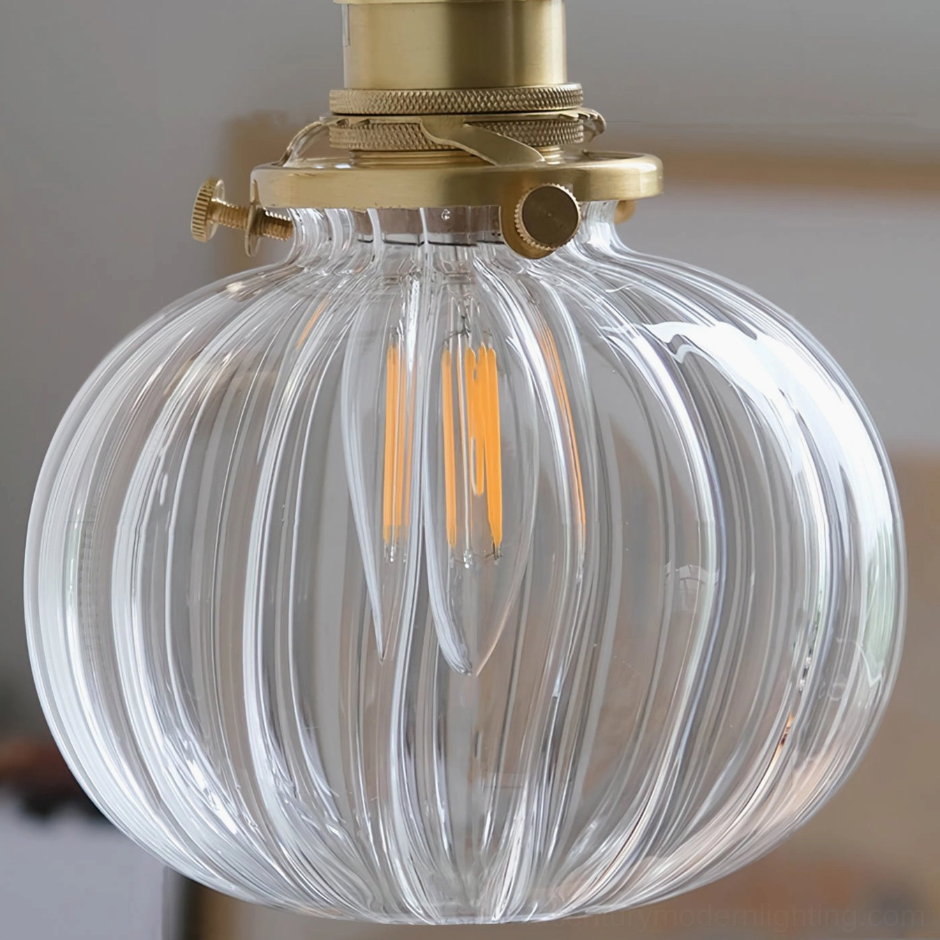 Close-up detail of vertically fluted ribbed glass shade texture - mid-century modern wall sconce craftsmanship