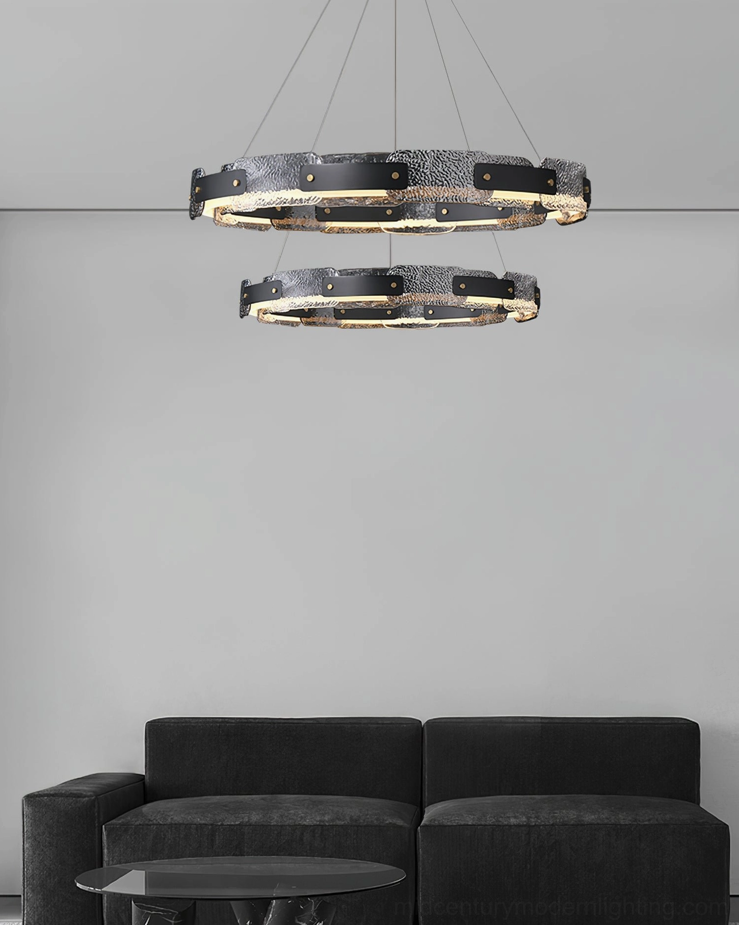 Fuze circular pendant light demonstrating integration in contemporary residential interior with minimalist furnishings