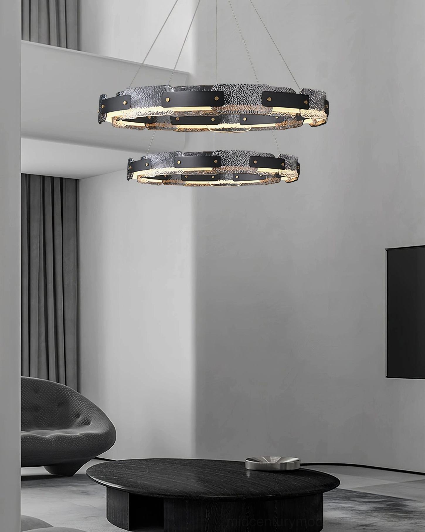 Fuze hand-forged iron ring pendant light demonstrating geometric form and contemporary chandelier craftsmanship