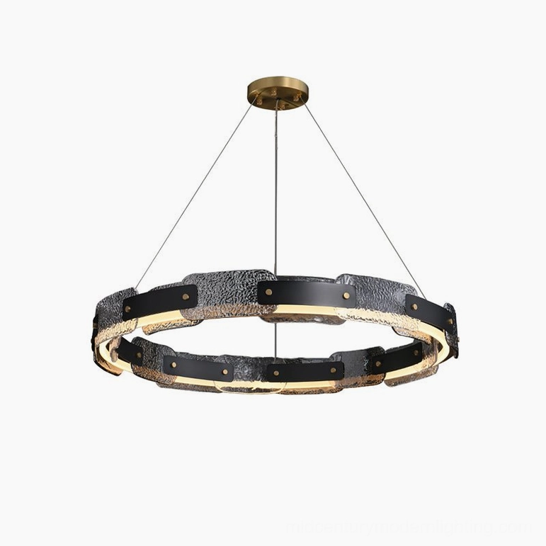 Fuze modern ring pendant light in refined interior, showing black iron frame with brass details and smoke glass