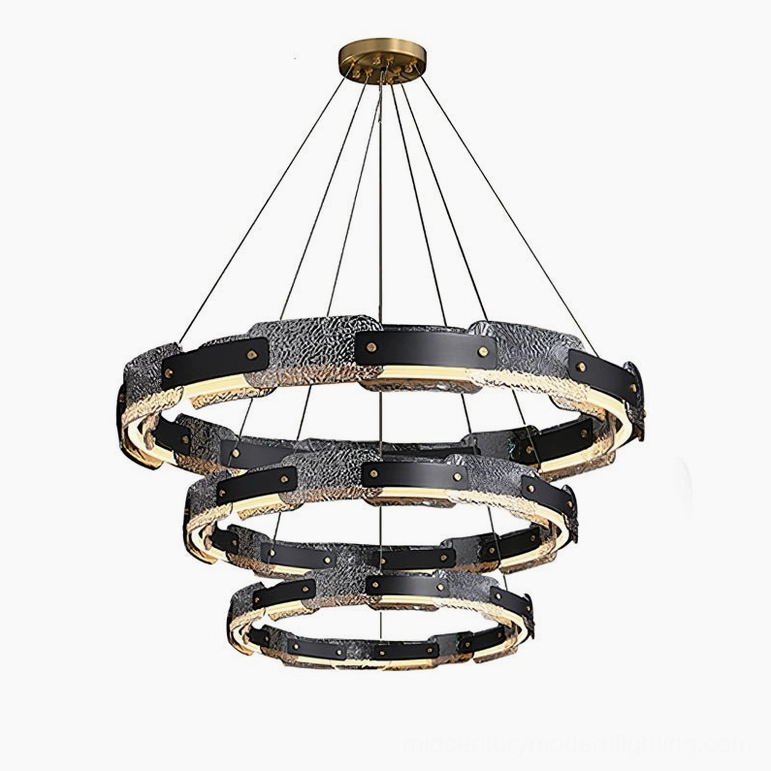Fuze stacked triple-ring pendant chandelier showing modular design capability and dramatic lighting impact in modern interior