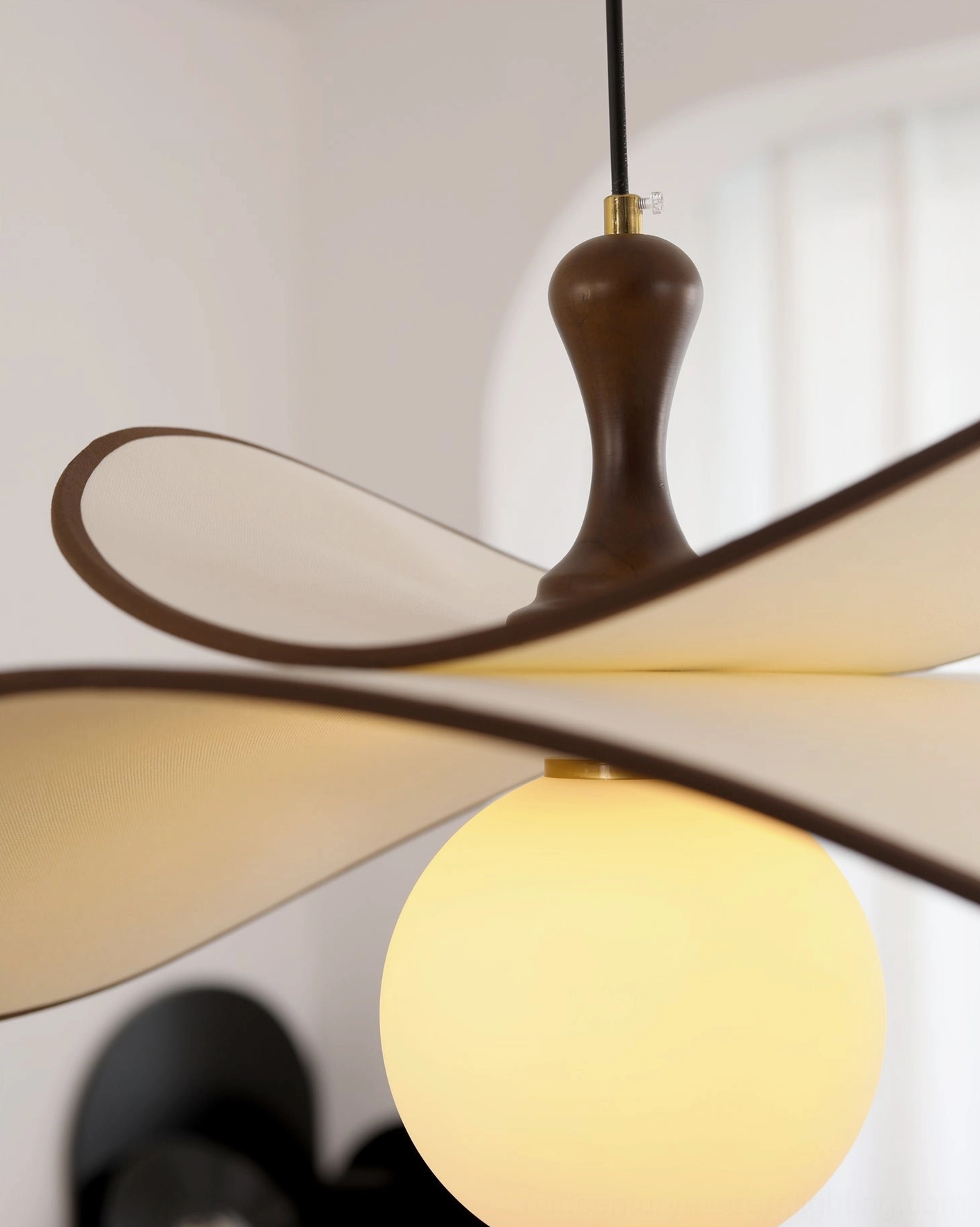 Fyano pendant light close-up macro detail wooden finial fabric petal shade frosted bulb craftsmanship