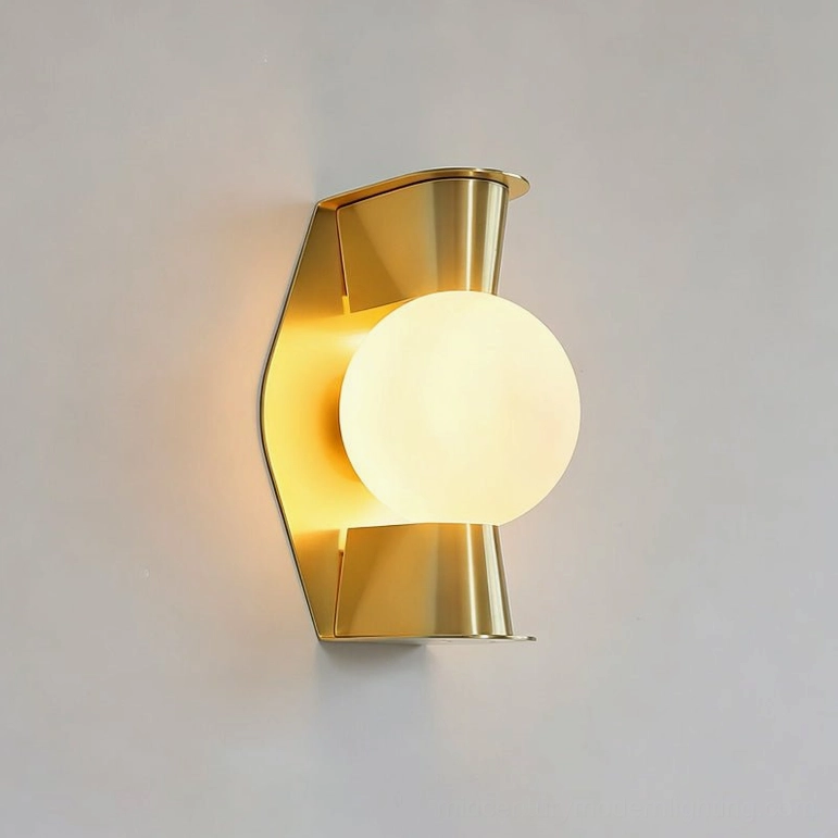 Gale Globe Wall Sconce close-up frontal shot with illuminated frosted glass orb showing brass gold finish and warm light diffusion
