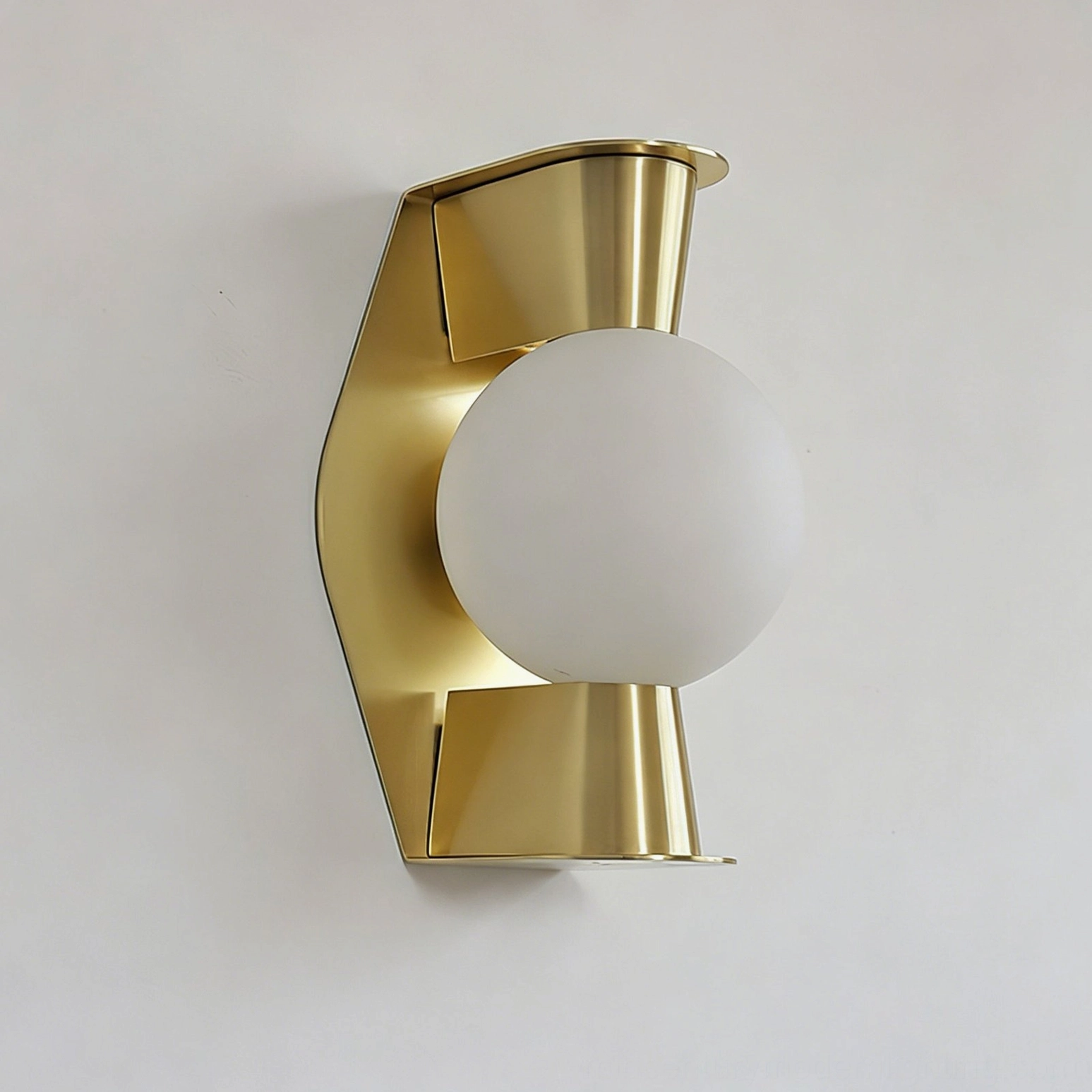 Gale Globe Wall Sconce right-angle shot displaying white frosted glass shade and polished gold metal frame details