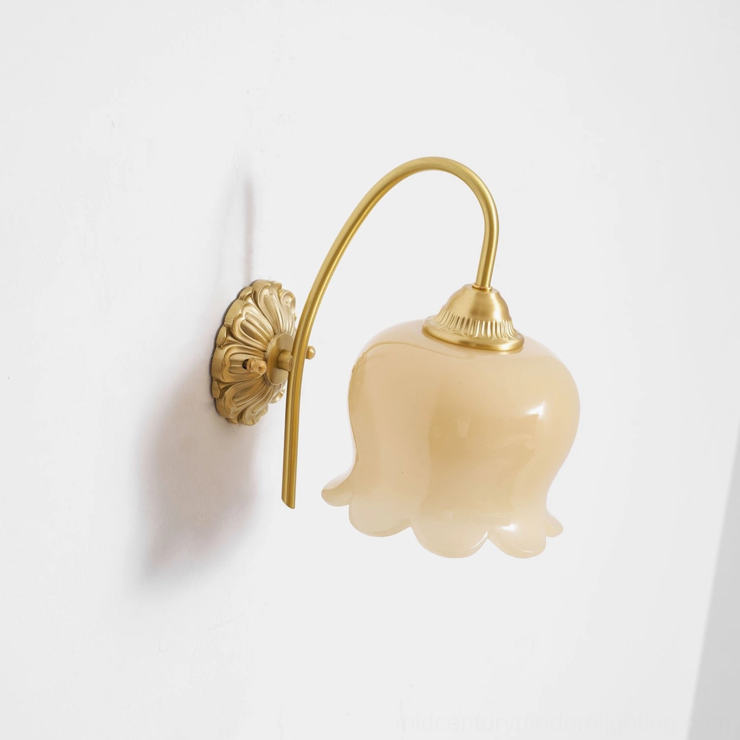 Lily of the valley wall lamp in gallery-style interior setting with complementary mid-century decor