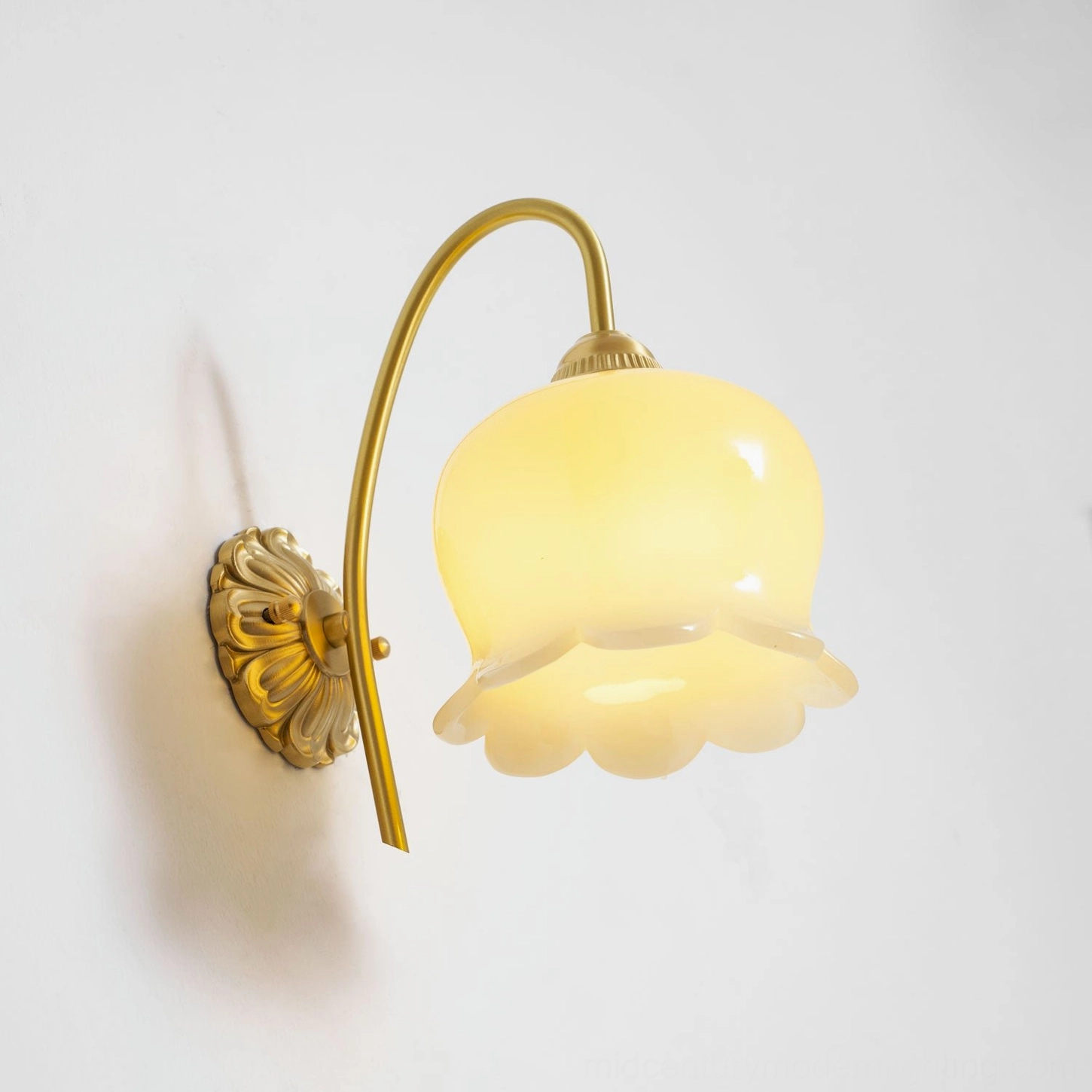 Lily of the valley wall sconce in gallery wall arrangement with other vintage lighting fixtures
