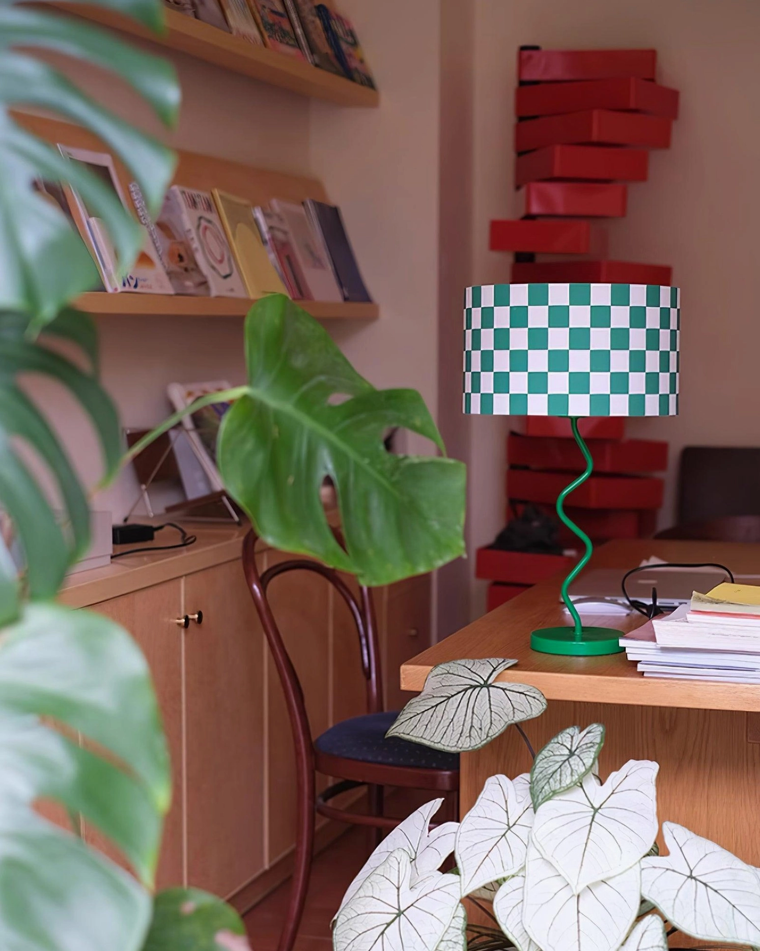 Contemporary fabric lampshade with geometric checkerboard pattern and spiral metal stem