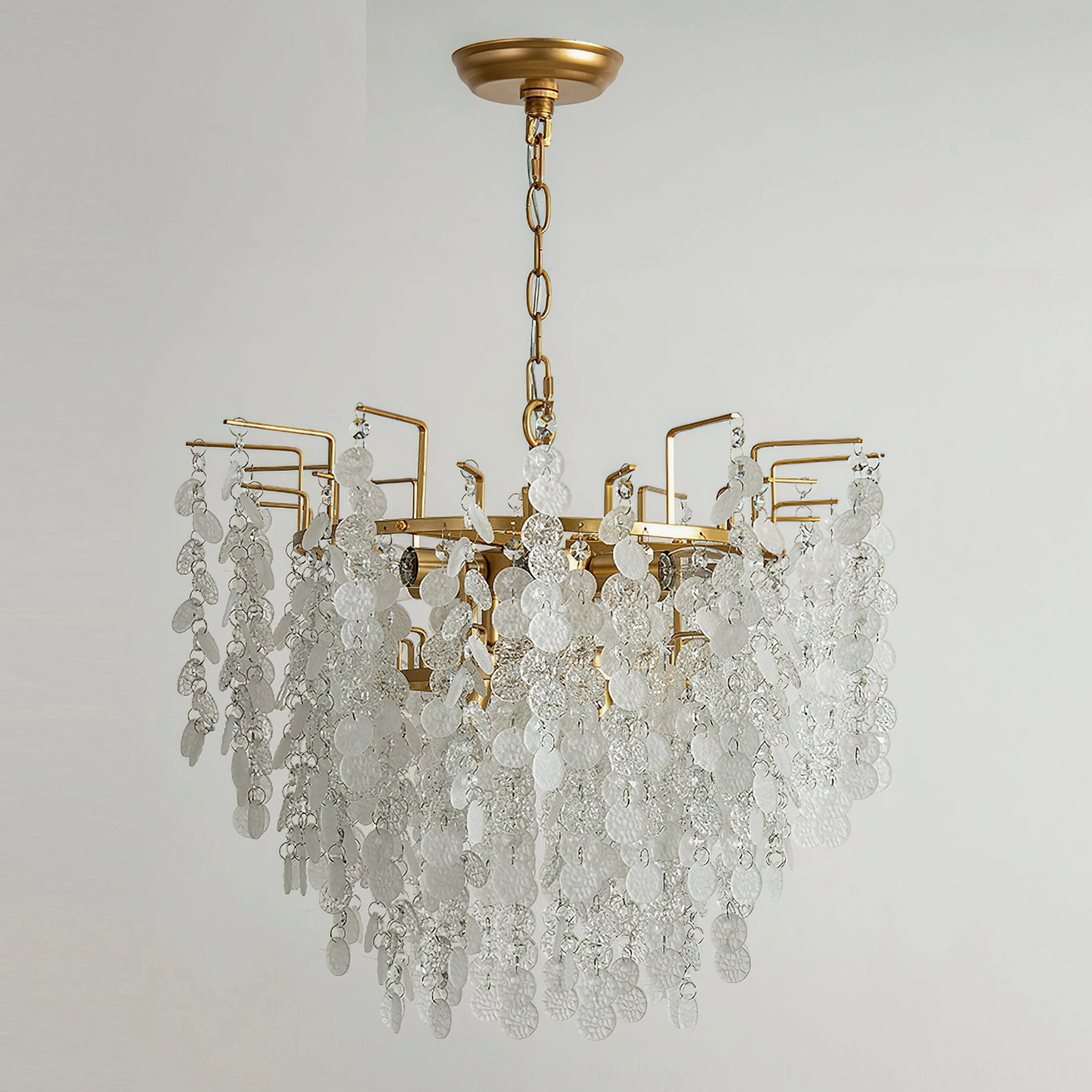 Gevan chandelier overhead close-up detail of layered crystal and brass elements