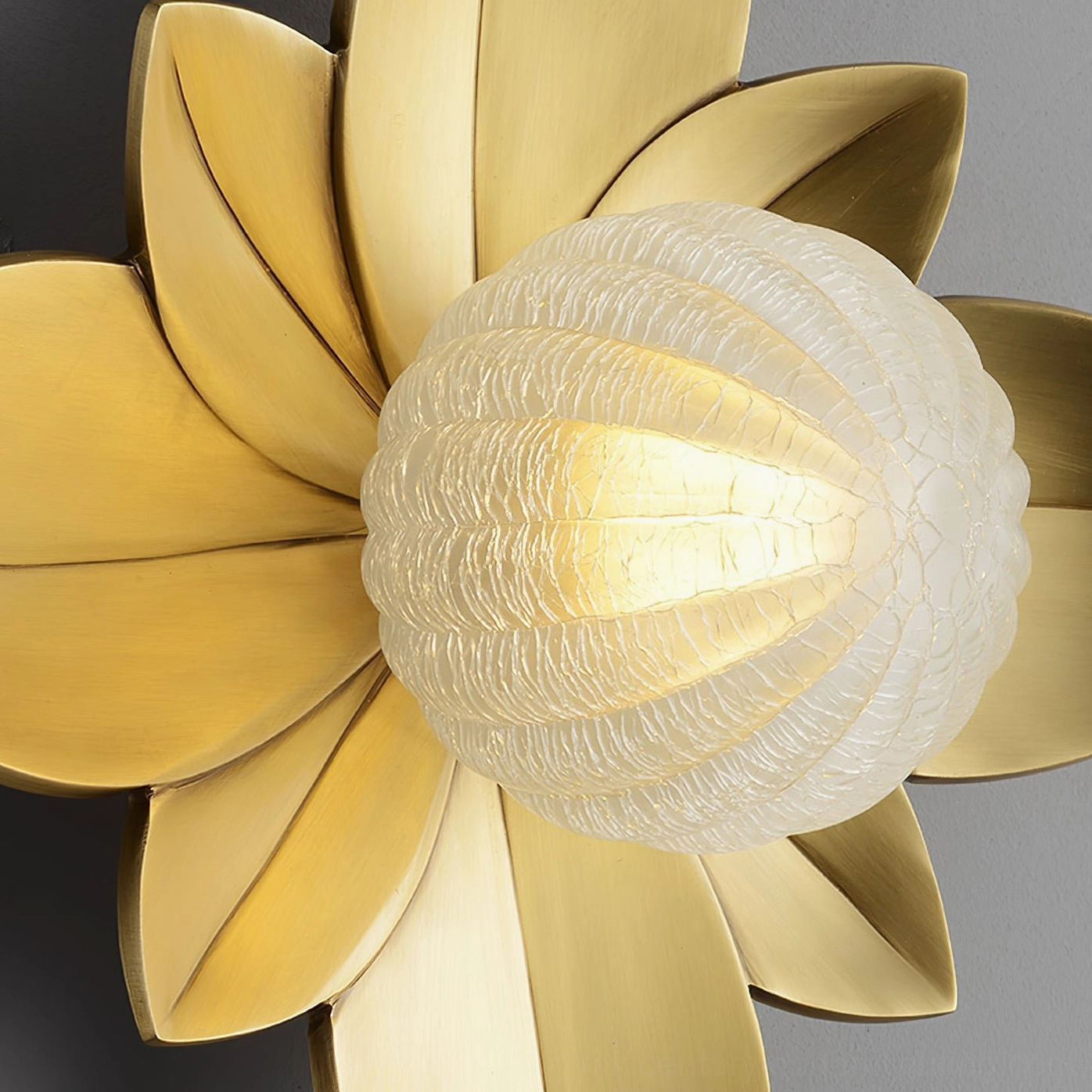 Gigi wall lamp fixture detail, brass construction and glass diffuser
