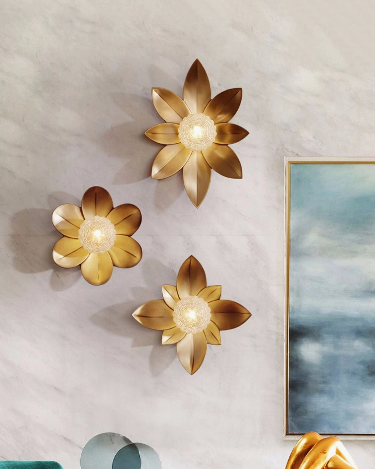 Gigi wall sconce installation detail, brass petal design and mounting